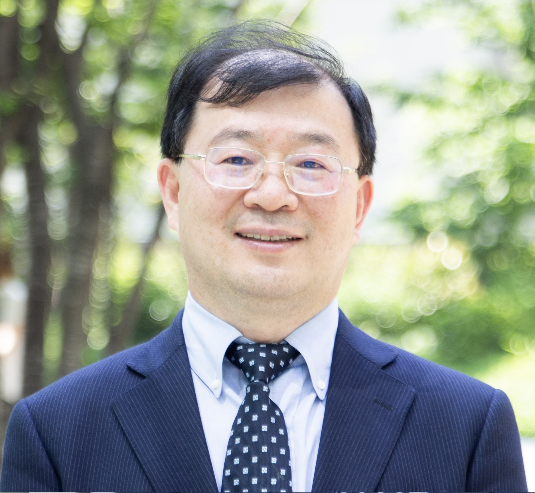 杜　穎富